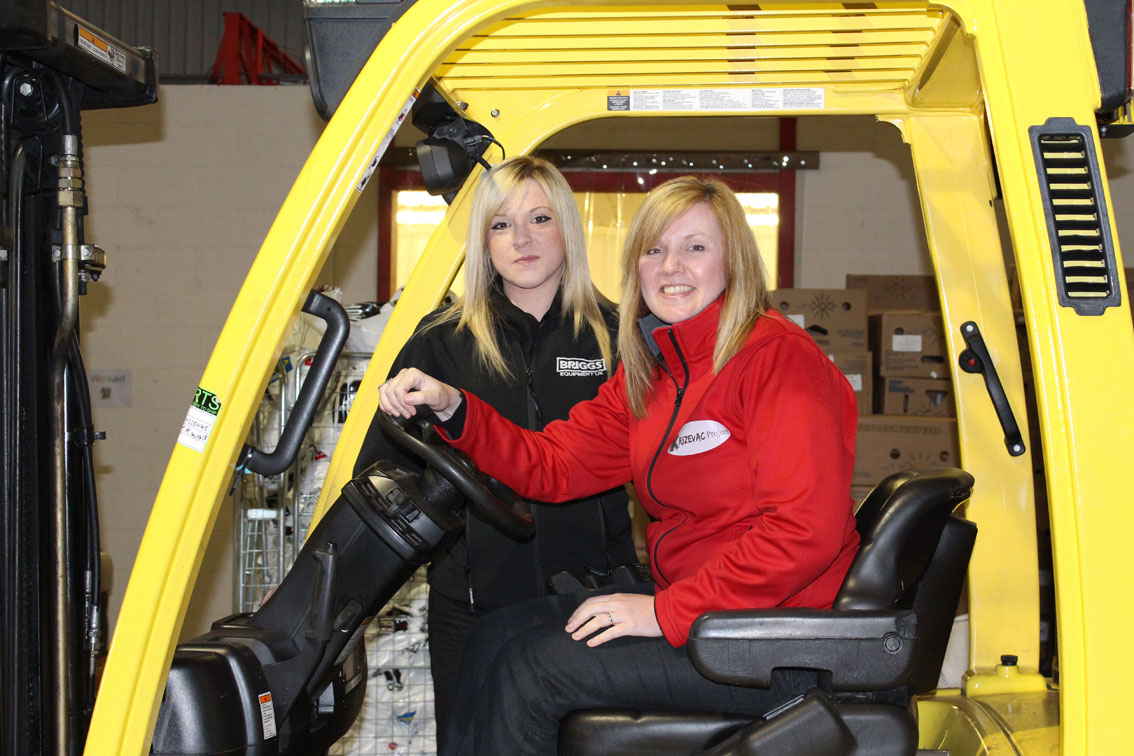Zoe and Chloe checking out the labour saving fork lift truck at Krizevac's Uttoxeter Warehouse
